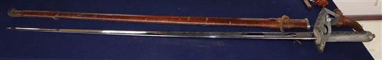 A George V Scots Guards officers dress sword, which belonged to Major W. L. Greenlees,